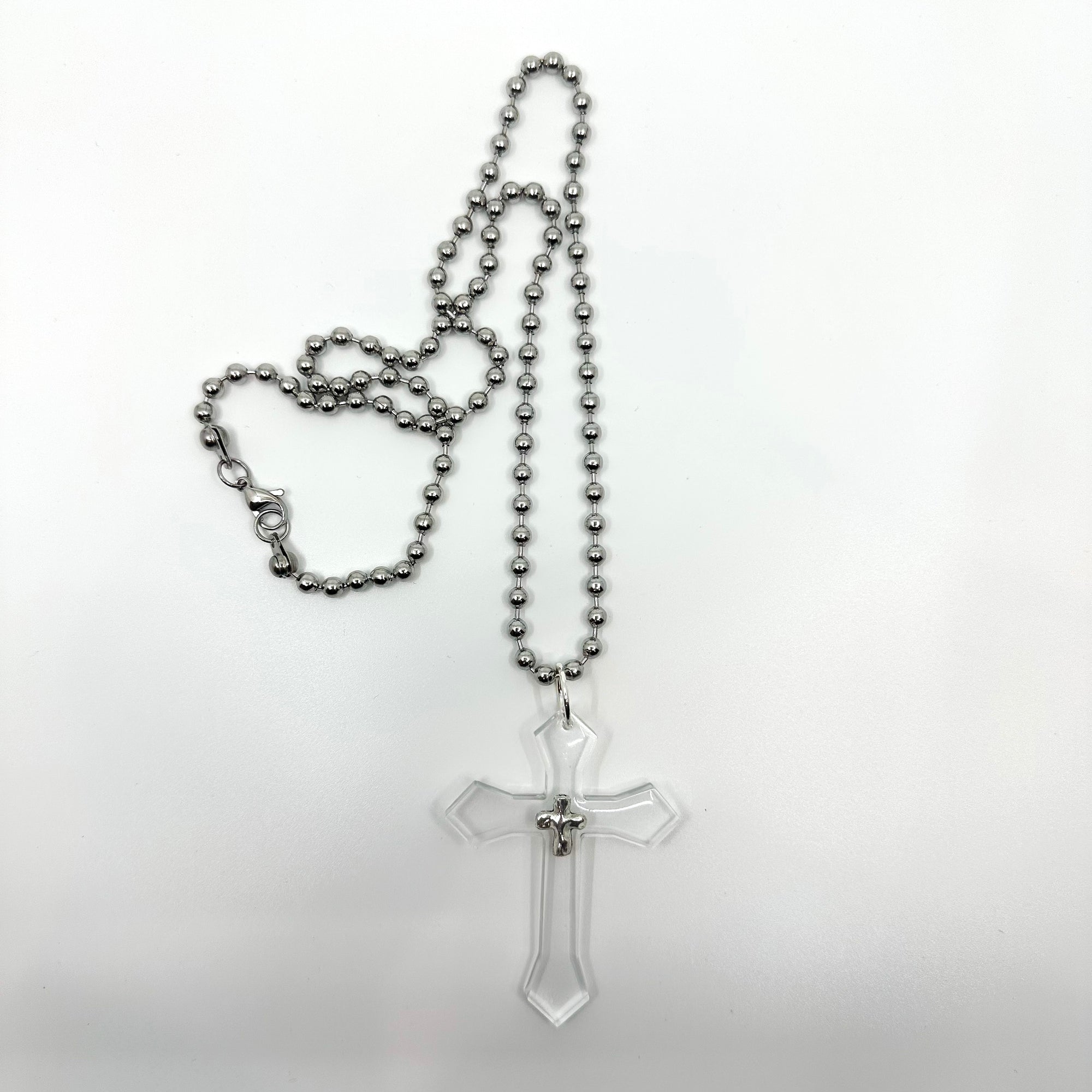 FLOATING CROSS [CLEAR]