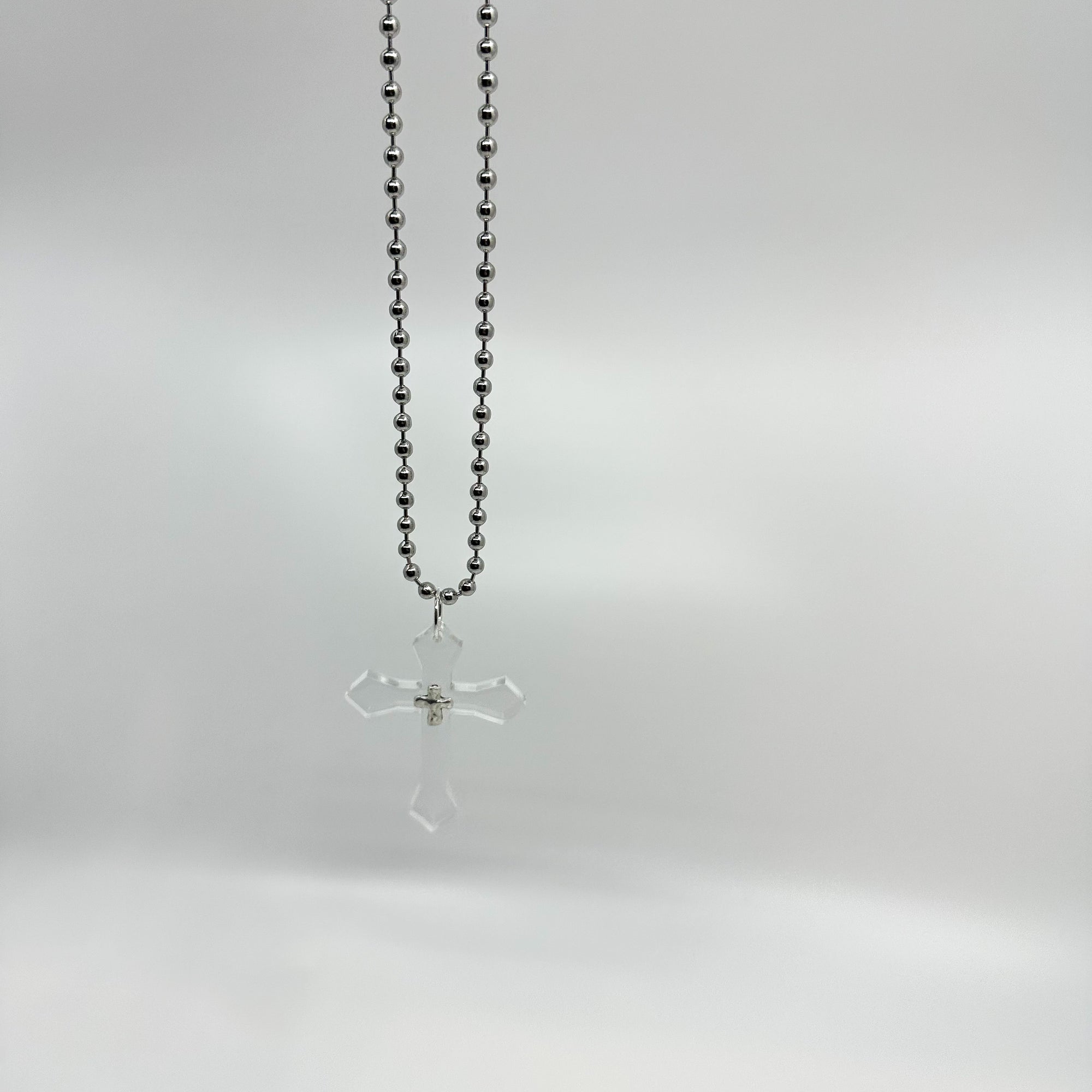 FLOATING CROSS [CLEAR]