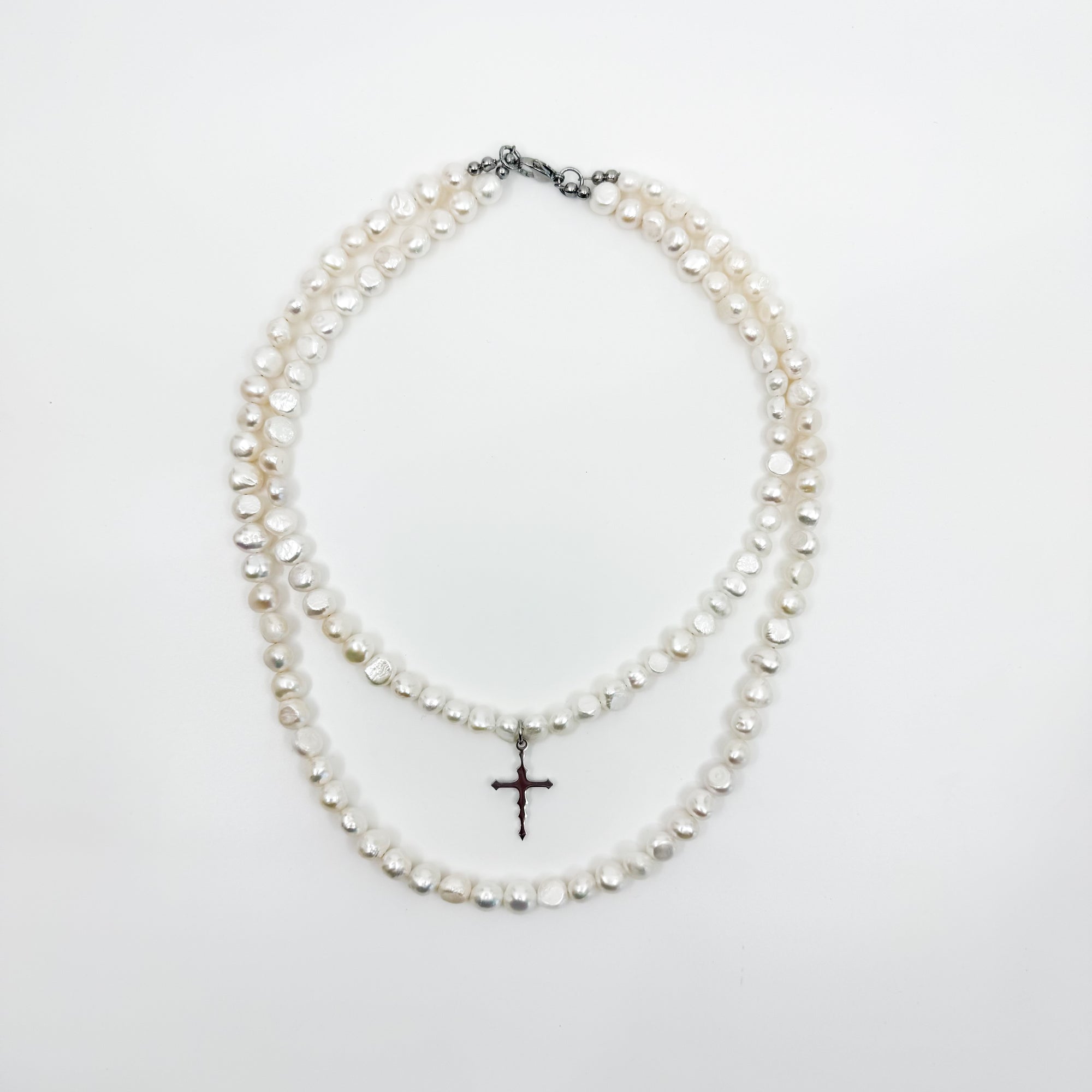 DOUBLE PEARL CROSS NECKLACE