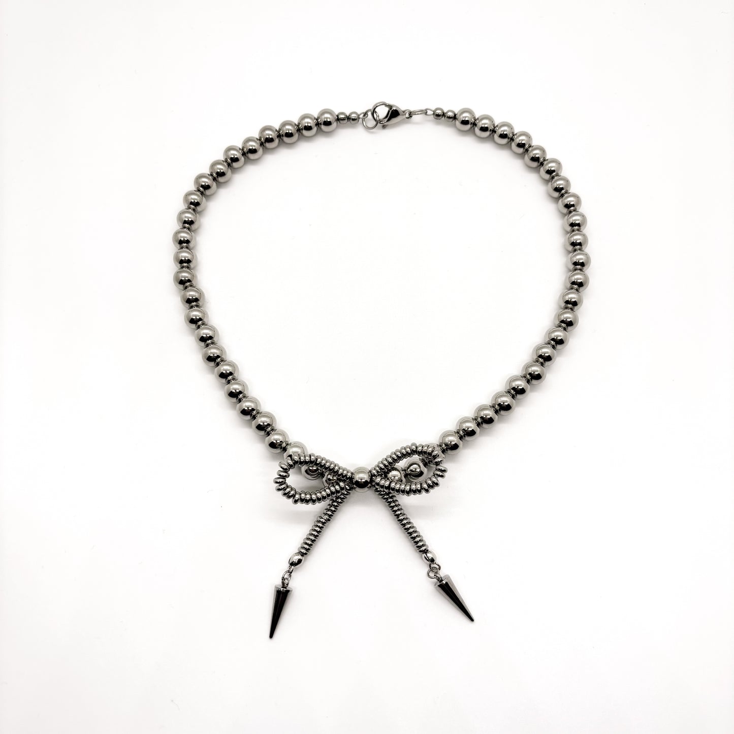 METAL BABYDOLL BOW NECKLACE